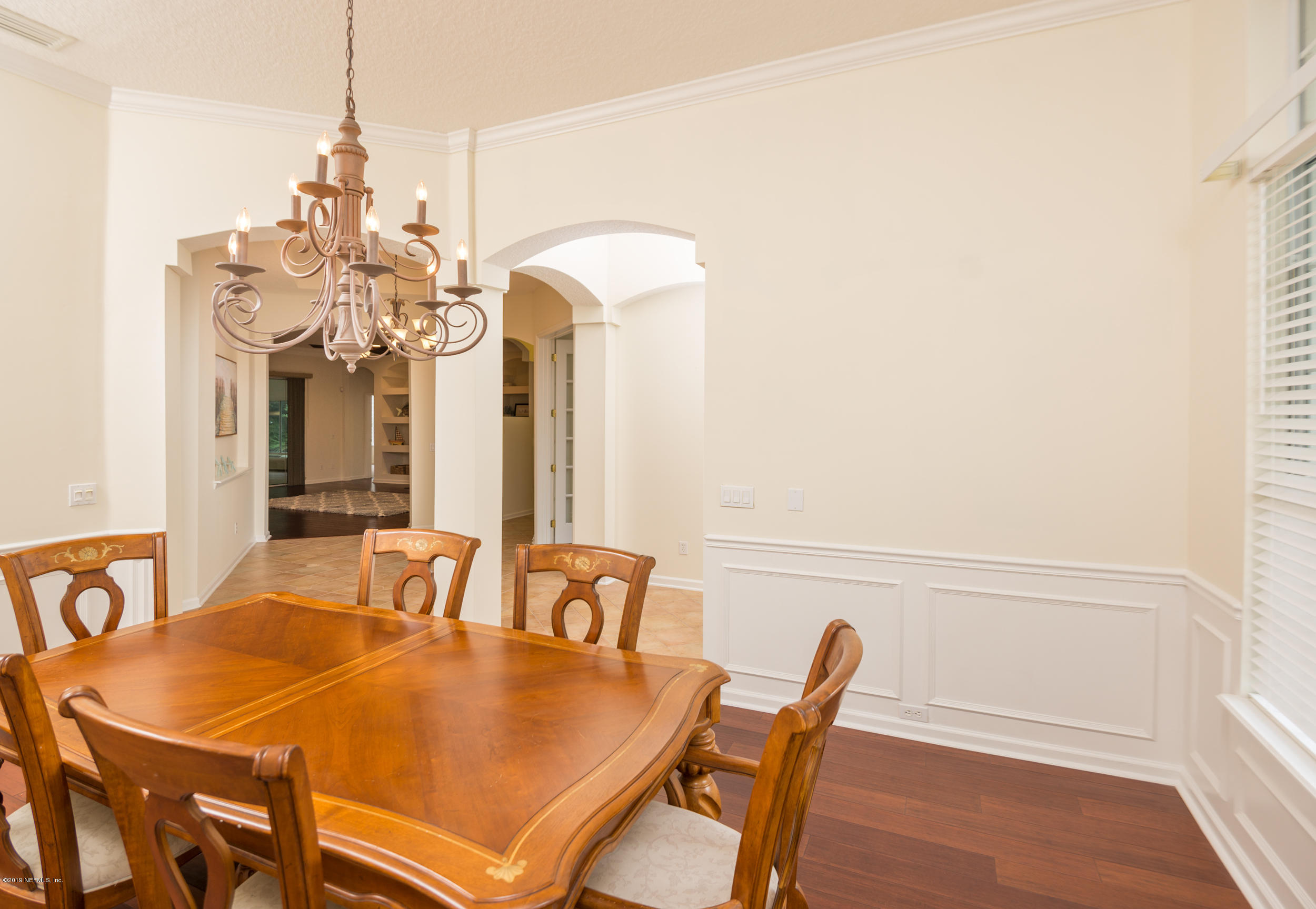 800 Riley Lane St. Augustine, FL 32095 - Photo 26 of 88 a view of a dining room with furniture and a chandelier