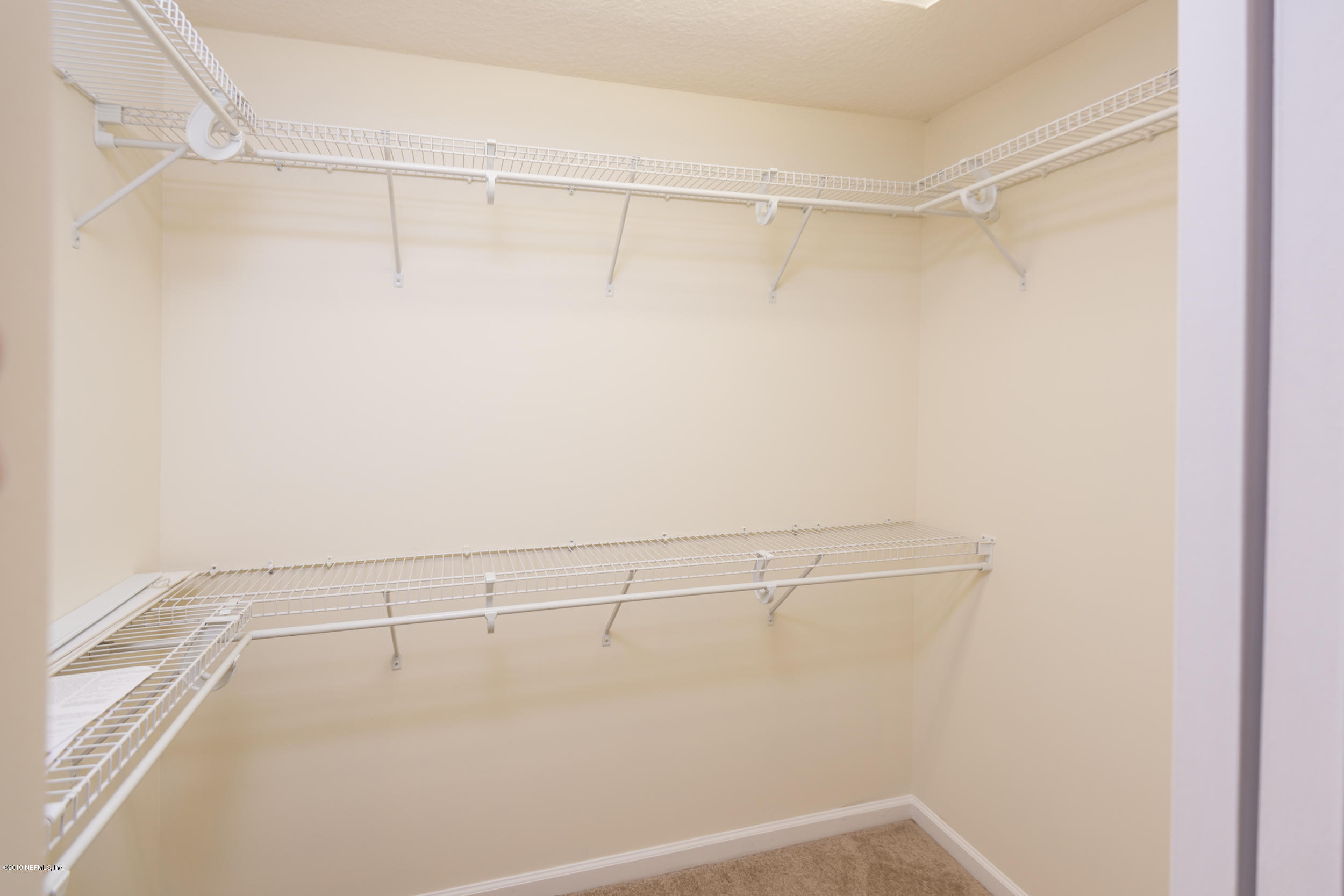800 Riley Lane St. Augustine, FL 32095 - Photo 34 of 88 a view of a room with racks on the wall