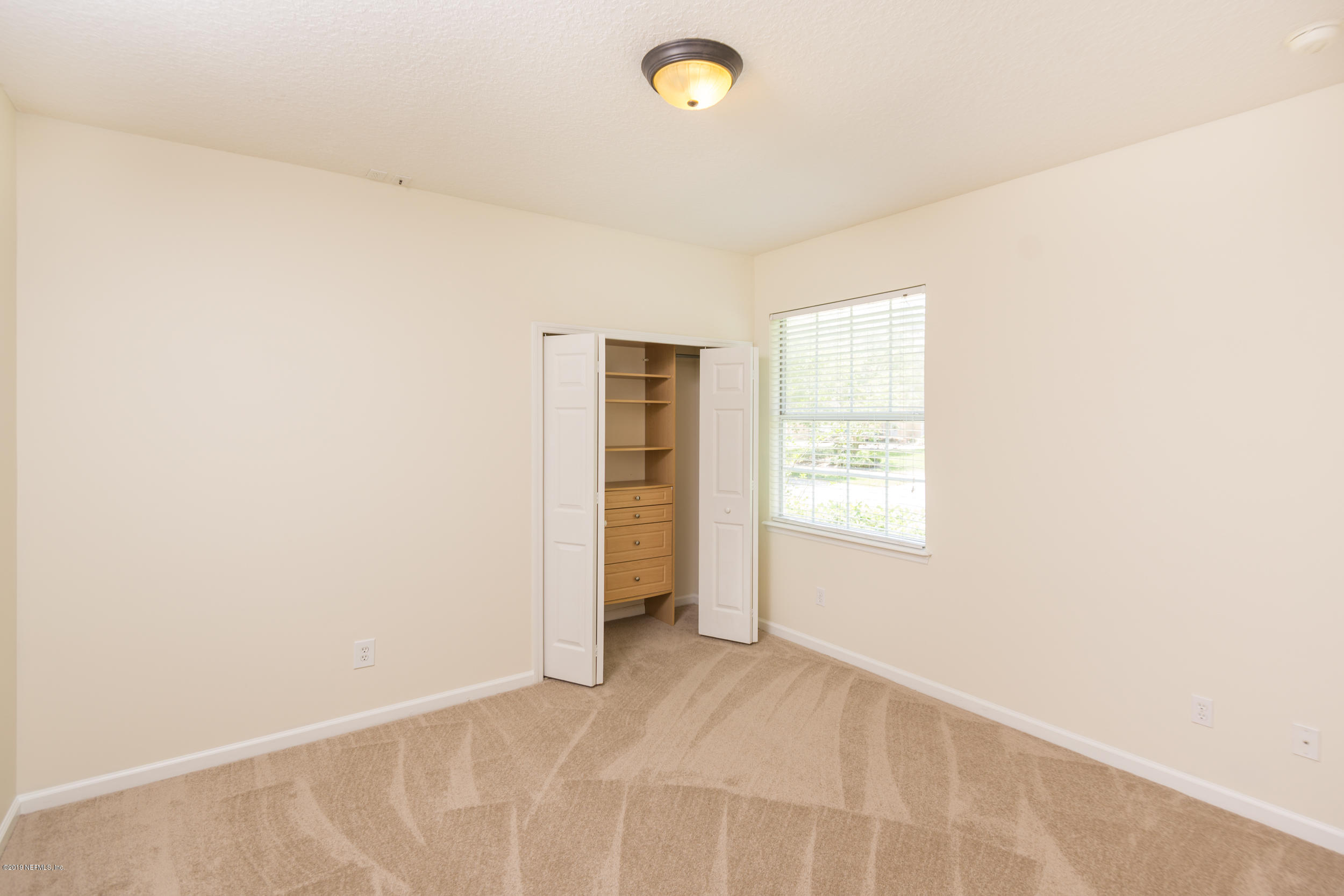800 Riley Lane St. Augustine, FL 32095 - Photo 38 of 88 a view of an empty room with a window