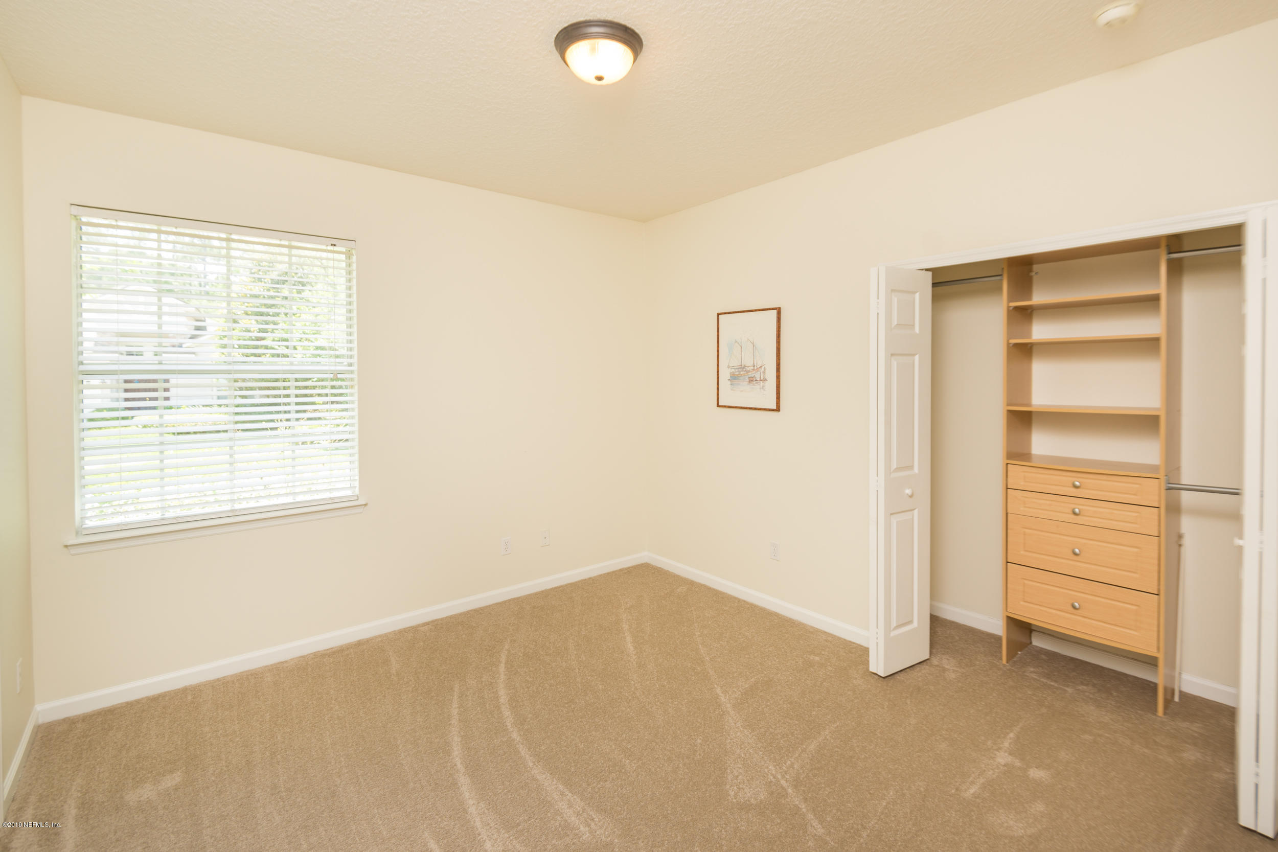 800 Riley Lane St. Augustine, FL 32095 - Photo 44 of 88 a view of an empty room with a window