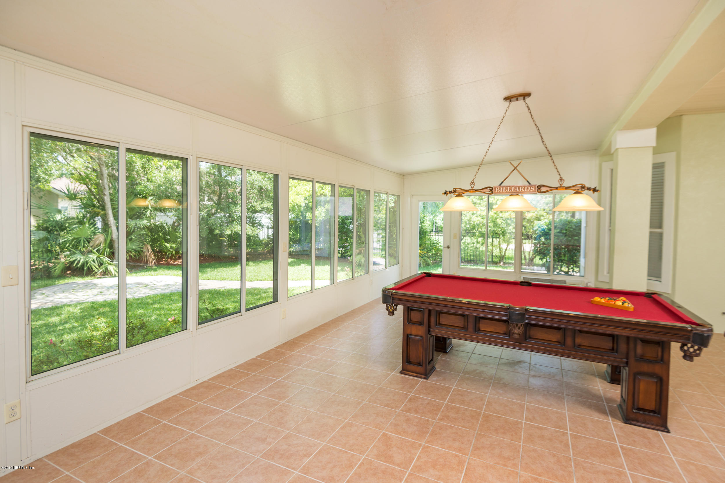 800 Riley Lane St. Augustine, FL 32095 - Photo 53 of 88 a room with pool table and windows