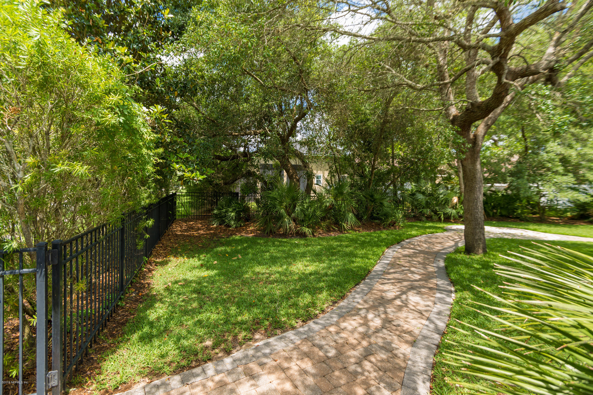 800 Riley Lane St. Augustine, FL 32095 - Photo 57 of 88 a view of a yard with plants and large trees