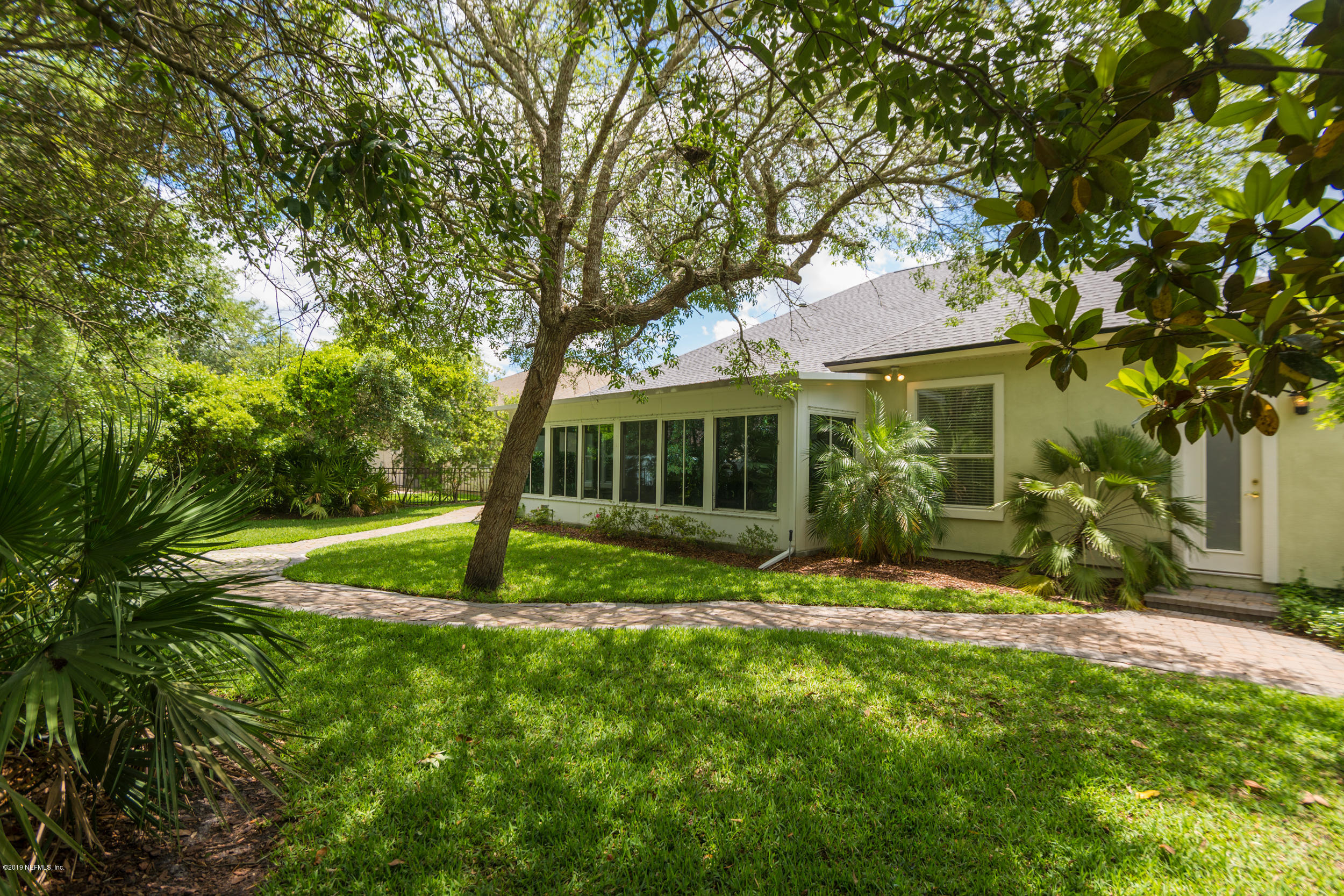 800 Riley Lane St. Augustine, FL 32095 - Photo 58 of 88 a view of house in front of a big yard with large trees