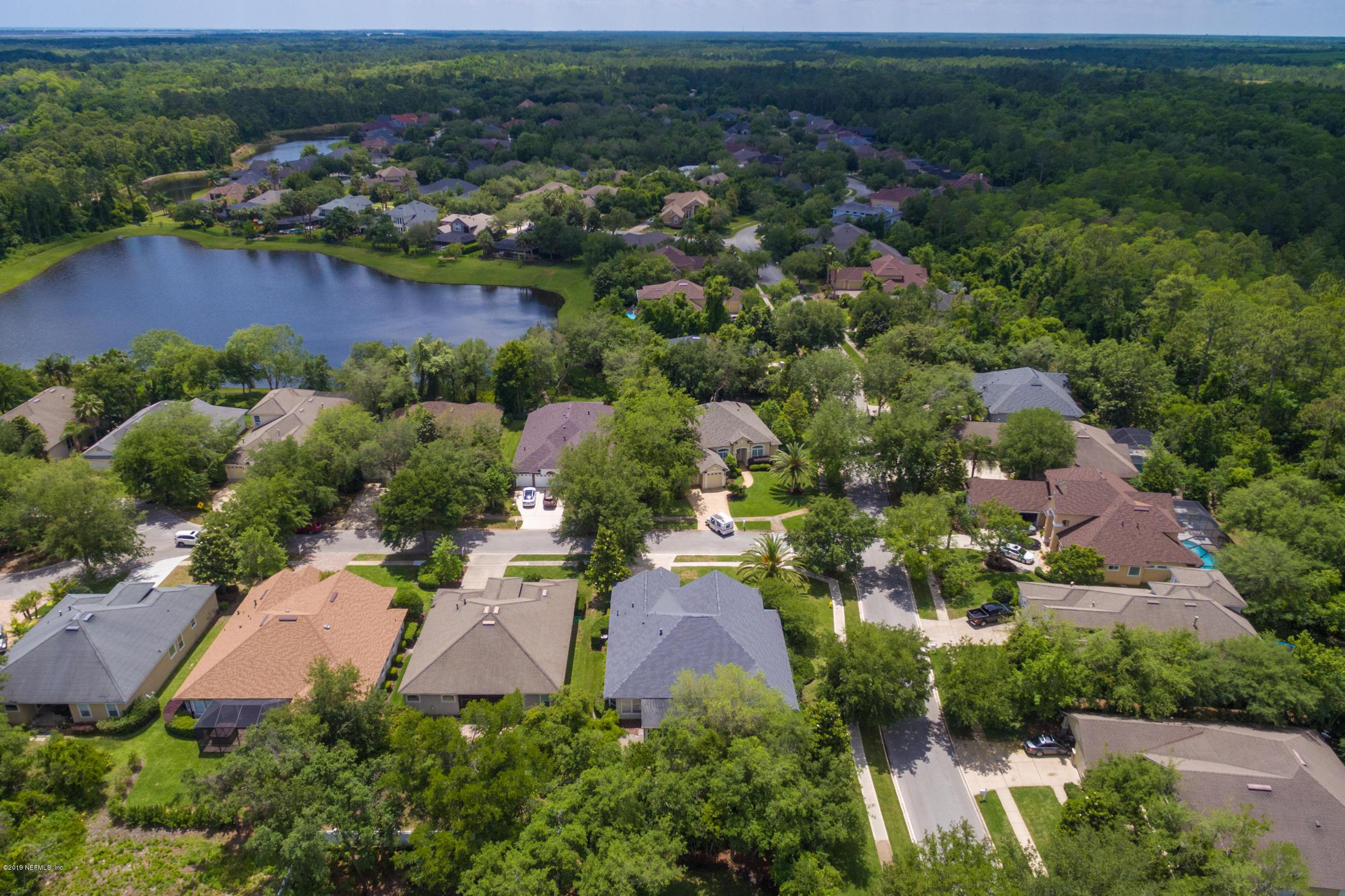 800 Riley Lane St. Augustine, FL 32095 - Photo 63 of 88 an aerial view of a houses with a yard