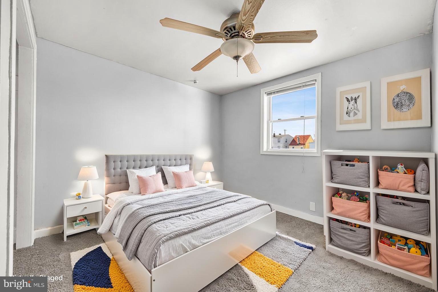 578 Swain Street Bristol, PA 19007 - Photo 12 of 17 a bedroom with a bed and a bookshelf