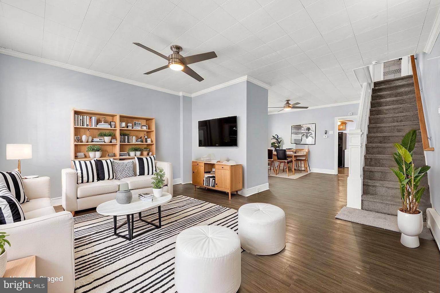 578 Swain Street Bristol, PA 19007 - Photo 2 of 17 a living room with furniture and a flat screen tv