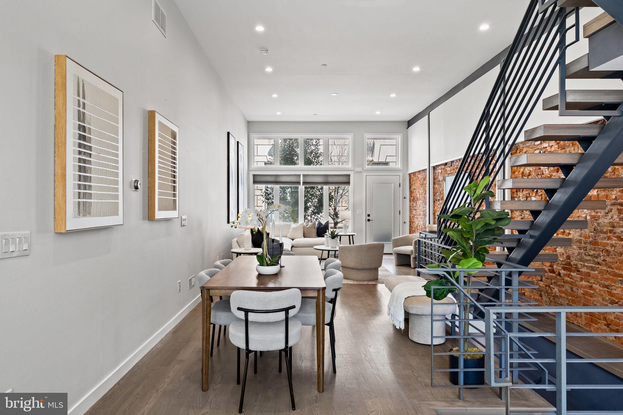 2106 Spring Street Philadelphia, PA 19103 - Photo 13 of 68 a dining room with furniture window and wooden floor