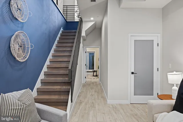 a bathroom with a shower and a sink