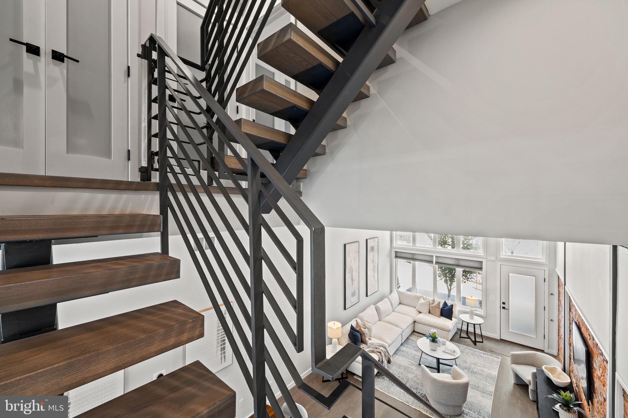 2106 Spring Street Philadelphia, PA 19103 - Photo 32 of 68 a view of entryway livingroom and hall with wooden floor
