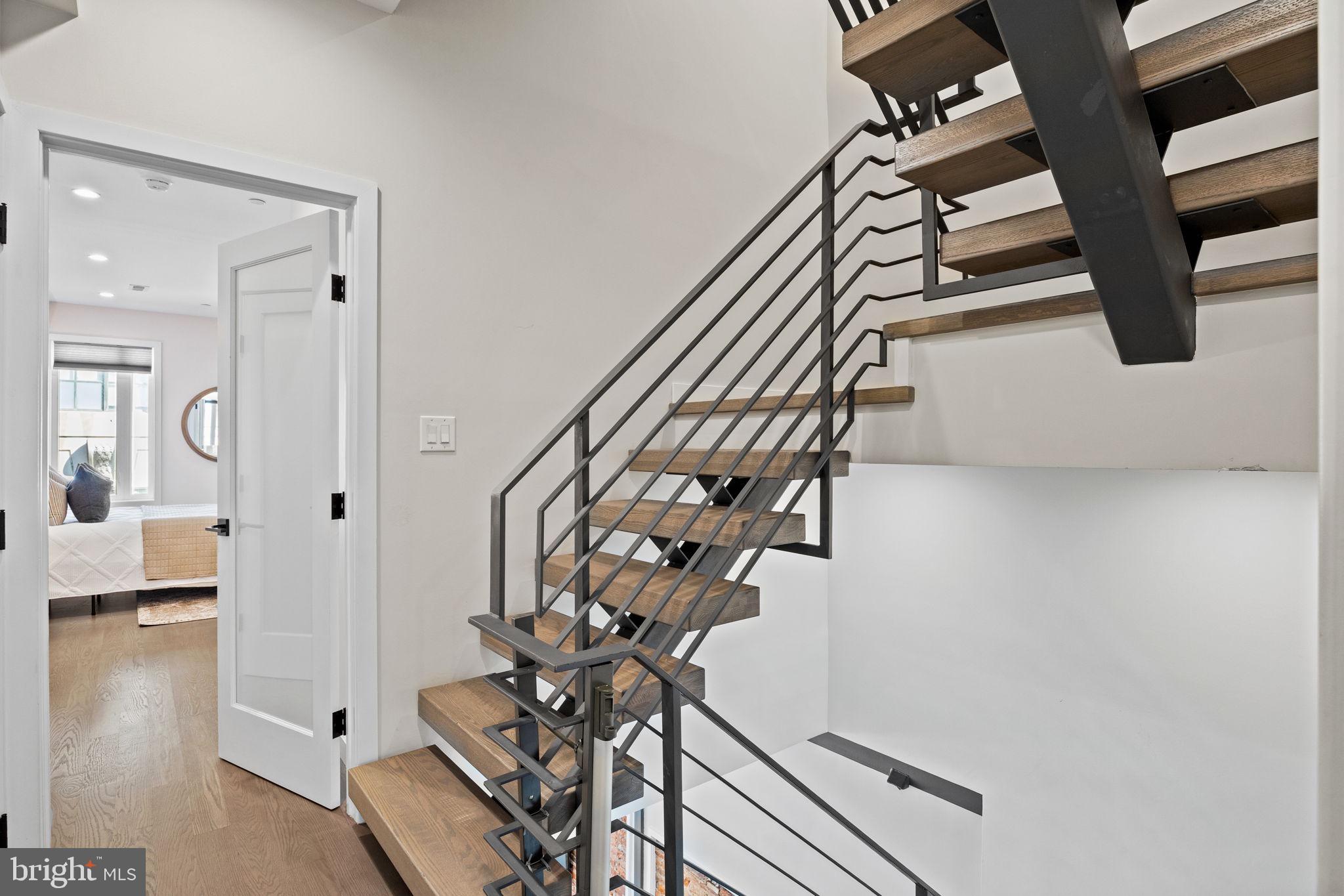 2106 Spring Street Philadelphia, PA 19103 - Photo 38 of 68 a view of entryway and hall with wooden floor