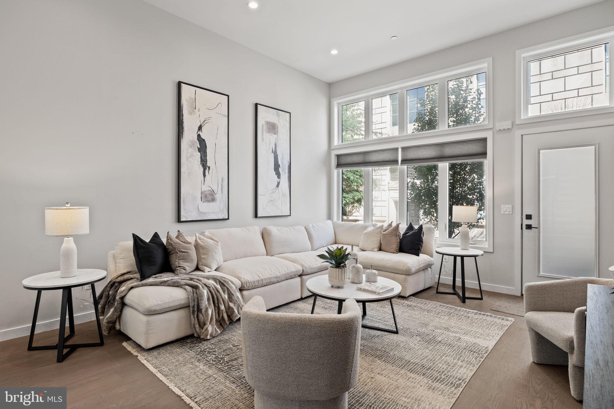 2106 Spring Street Philadelphia, PA 19103 - Photo 4 of 68 a living room with furniture and a large window