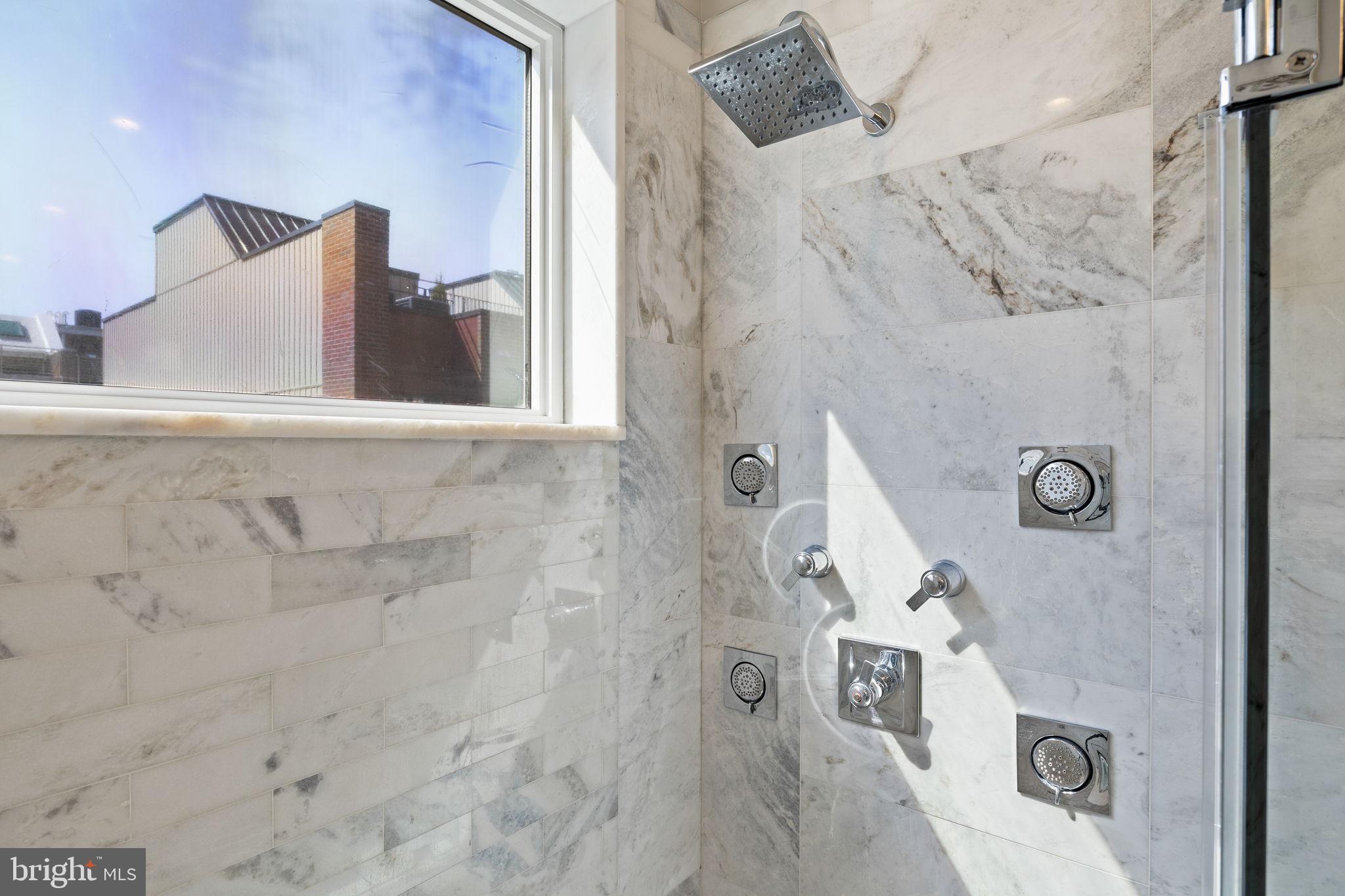 2106 Spring Street Philadelphia, PA 19103 - Photo 53 of 68 a bathroom with a bathtub and shower