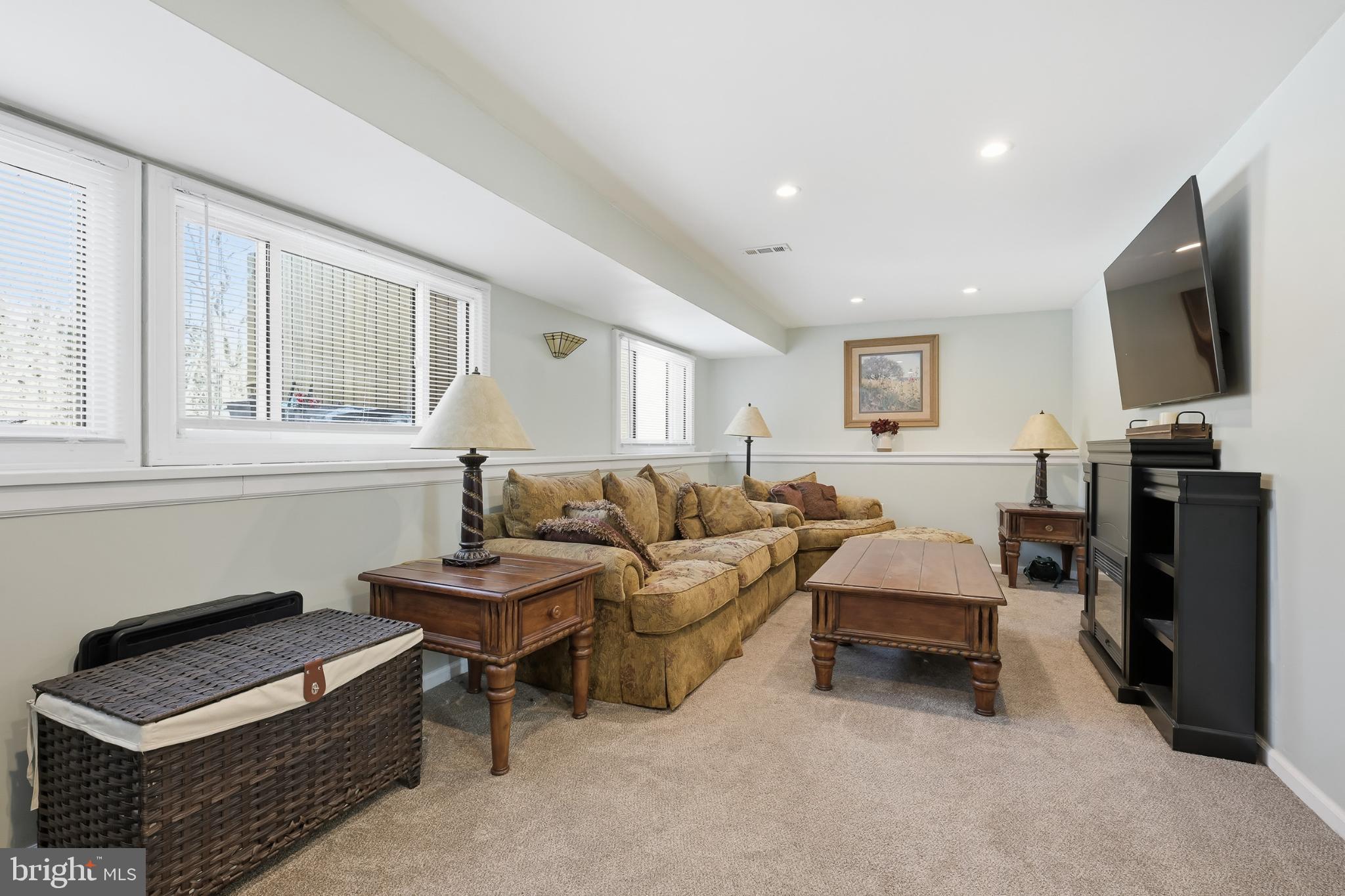619 Shue Drive Newark, DE 19713 - Photo 18 of 30 a living room with furniture and a flat screen tv