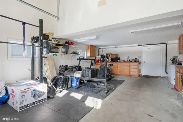 a view of a garage with a bike and window