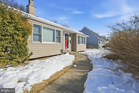 a front view of house with yard