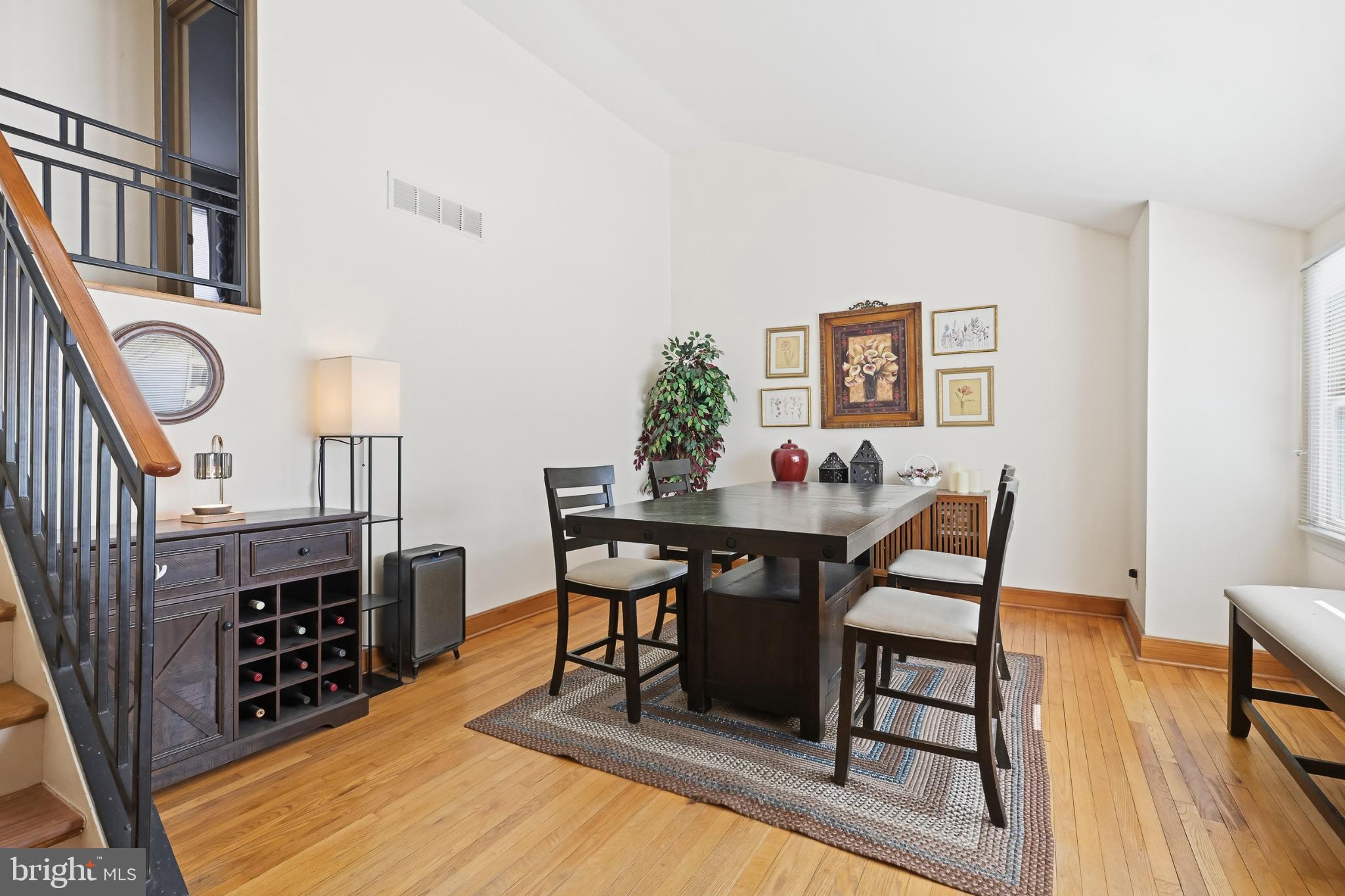 619 Shue Drive Newark, DE 19713 - Photo 5 of 30 a view of a dining room with furniture and wooden floor