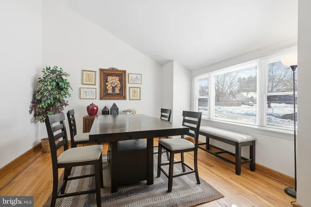 a view of a livingroom with furniture and a potted plant