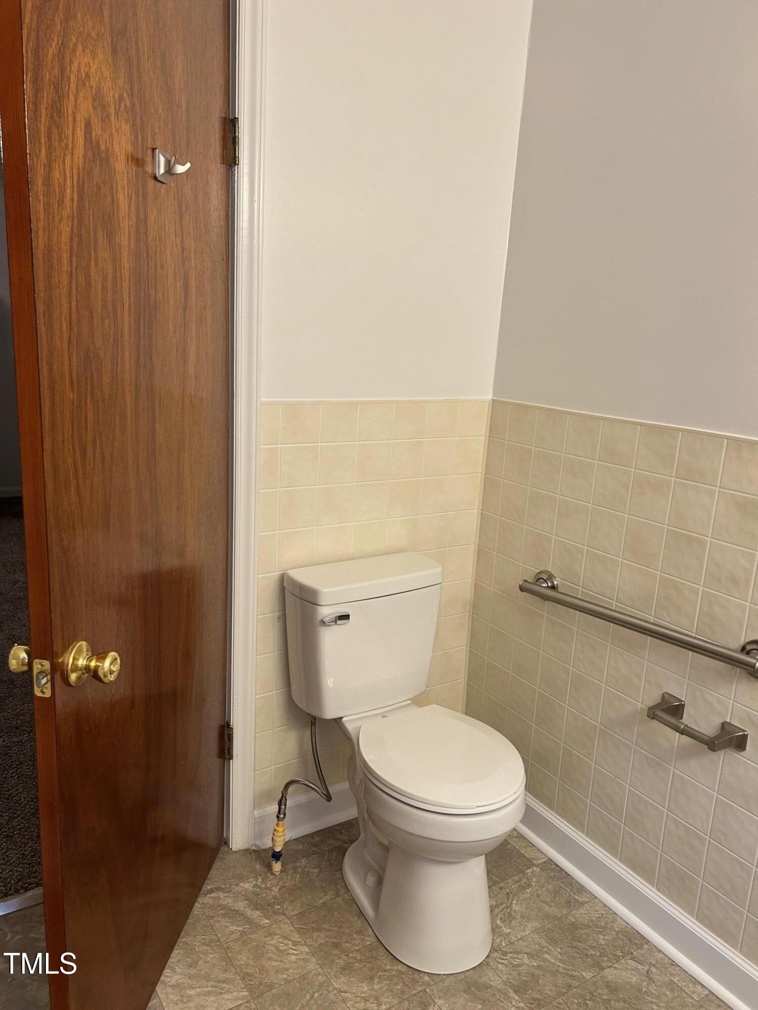 10841 Highway 32 Roper, NC 27970 - Photo 11 of 29 a white toilet sitting next to a bathroom sink