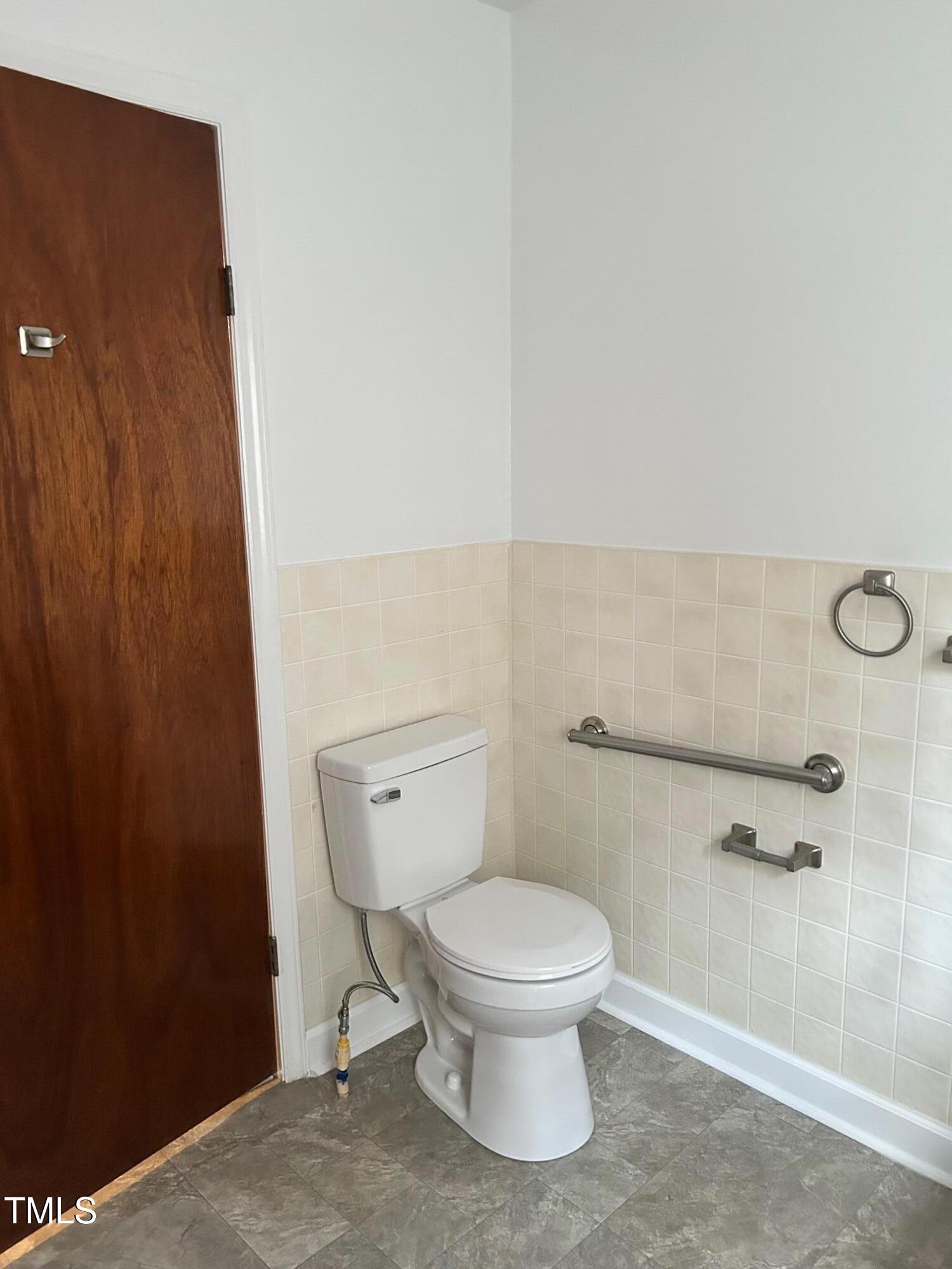 10841 Highway 32 Roper, NC 27970 - Photo 13 of 29 a white toilet sitting next to a shower curtain
