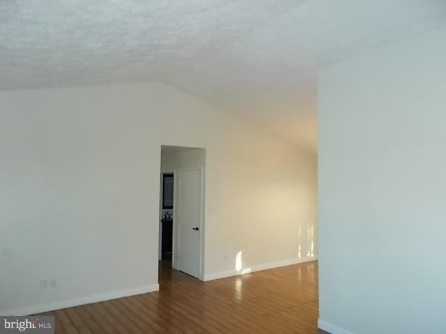 519 Nollmeyer Road Baltimore, MD 21220 - Photo 4 of 15 Living Room with Cathedral ceilings