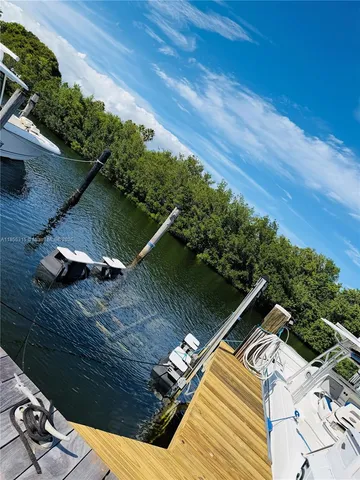 a view of a balcony with chairs