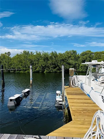 a view of a lake with boats