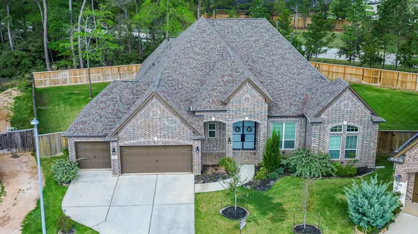 $799,999 | 1050 Groveton Ridge Lane, Pinehurst, TX 77362
