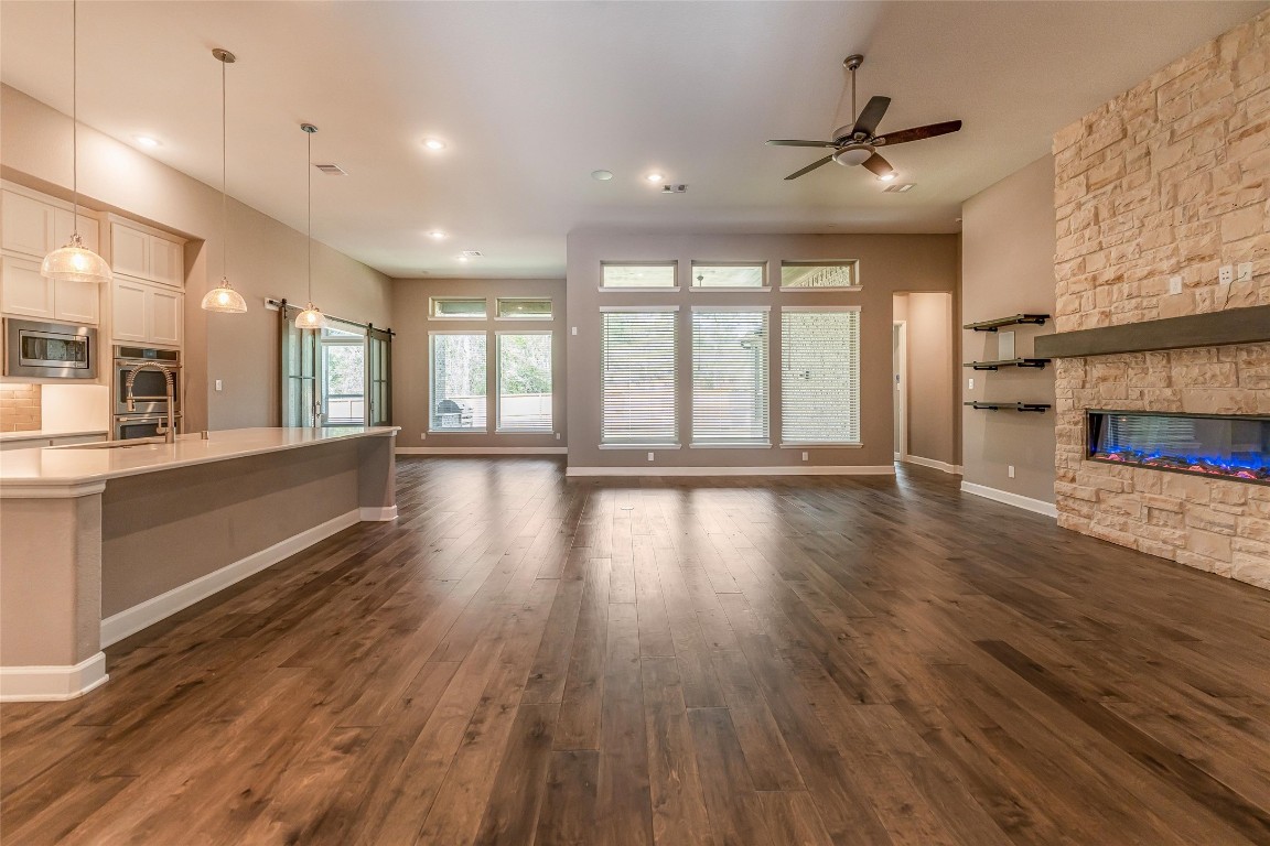 1050 Groveton Ridge Lane Pinehurst, TX 77362 - Photo 14 of 50 Notice the wood floors throughout