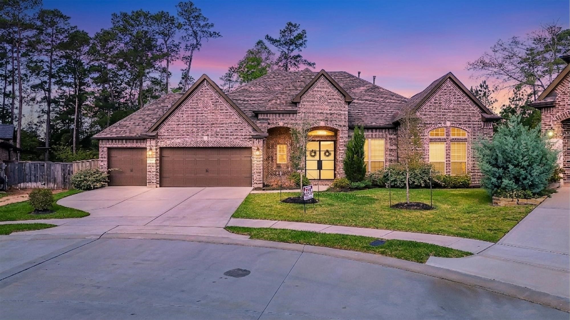 1050 Groveton Ridge Lane Pinehurst, TX 77362 - Photo 2 of 50 Twilight front elevation