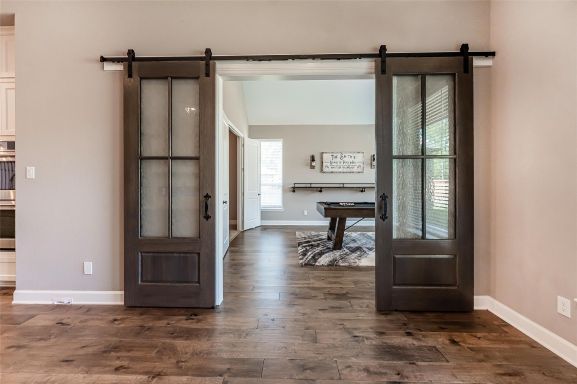 1050 Groveton Ridge Lane Pinehurst, TX 77362 - Photo 23 of 50 Notice the sliding barn doors to the game room