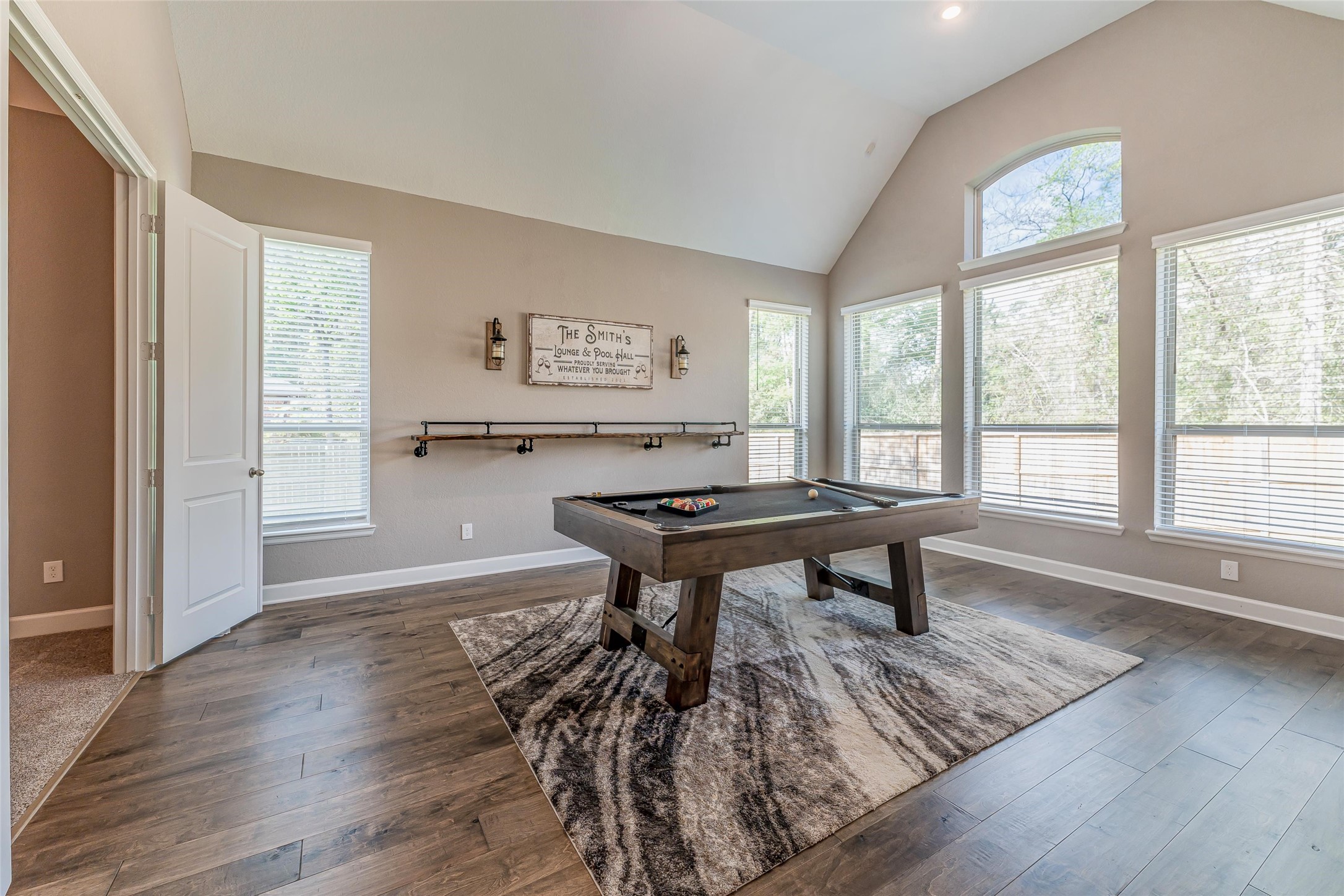 1050 Groveton Ridge Lane Pinehurst, TX 77362 - Photo 24 of 50 a room with furniture pool table and wooden floor