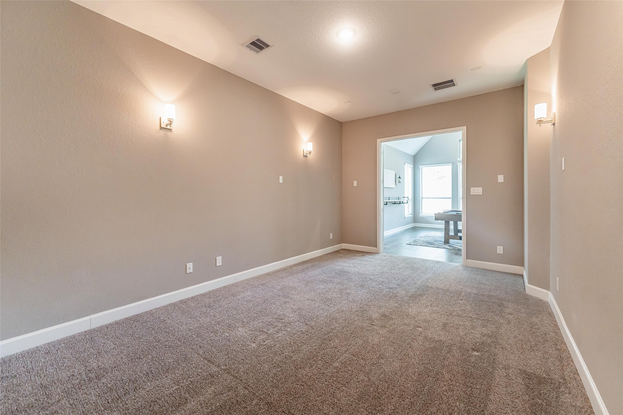 1050 Groveton Ridge Lane Pinehurst, TX 77362 - Photo 27 of 50 an empty room with an empty space and windows