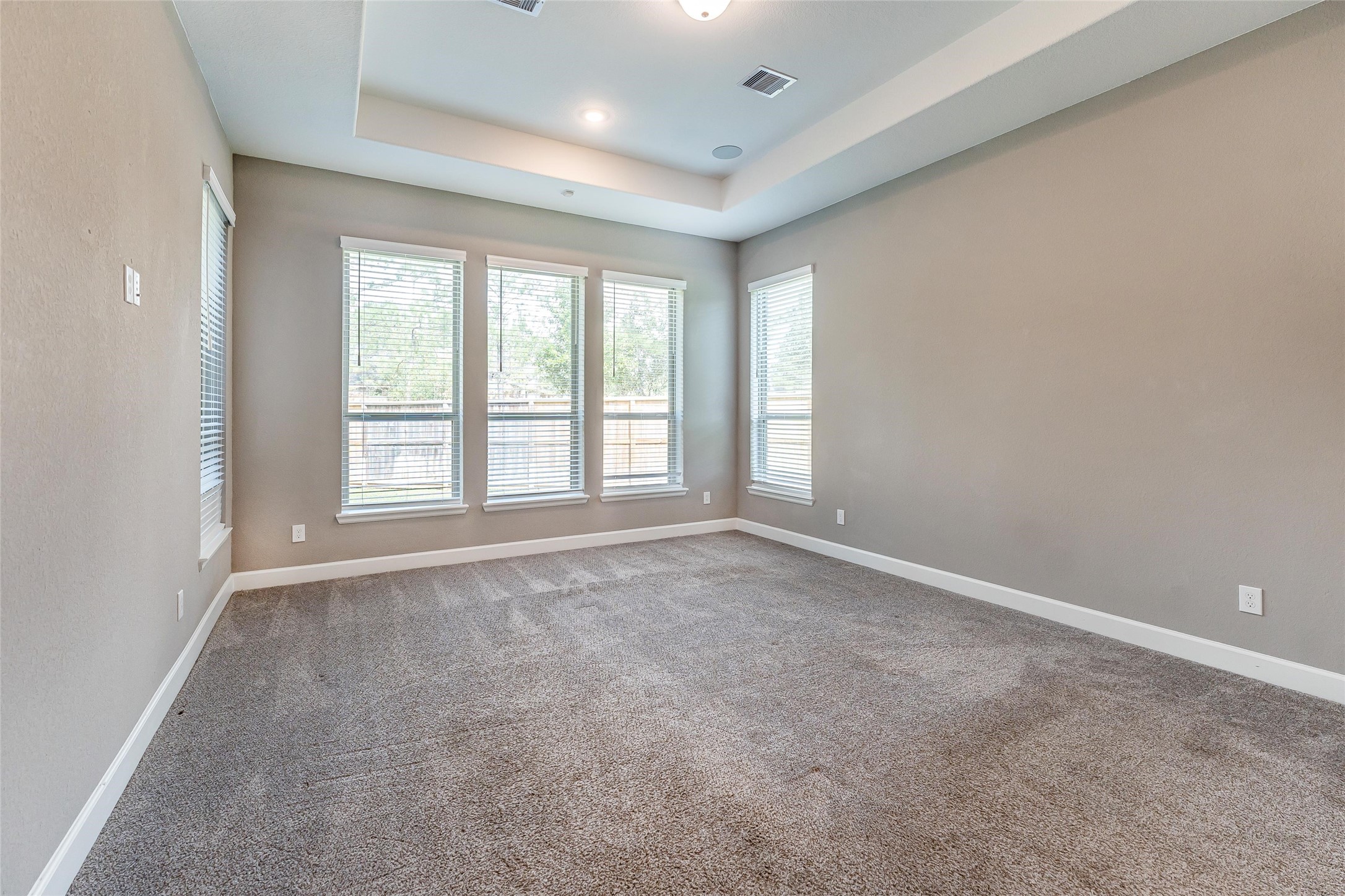 1050 Groveton Ridge Lane Pinehurst, TX 77362 - Photo 28 of 50 an empty room with windows