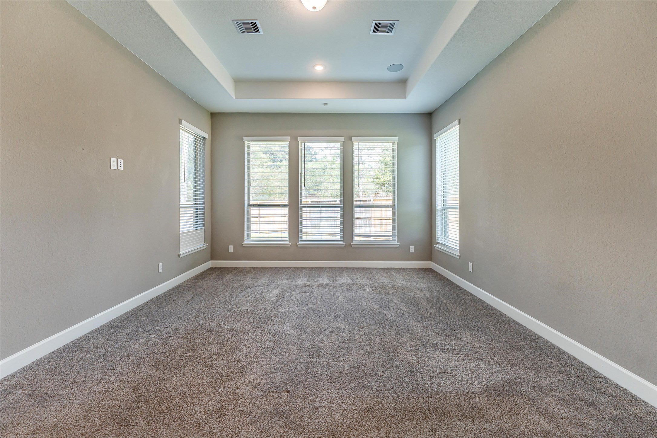 1050 Groveton Ridge Lane Pinehurst, TX 77362 - Photo 29 of 50 an empty room with windows