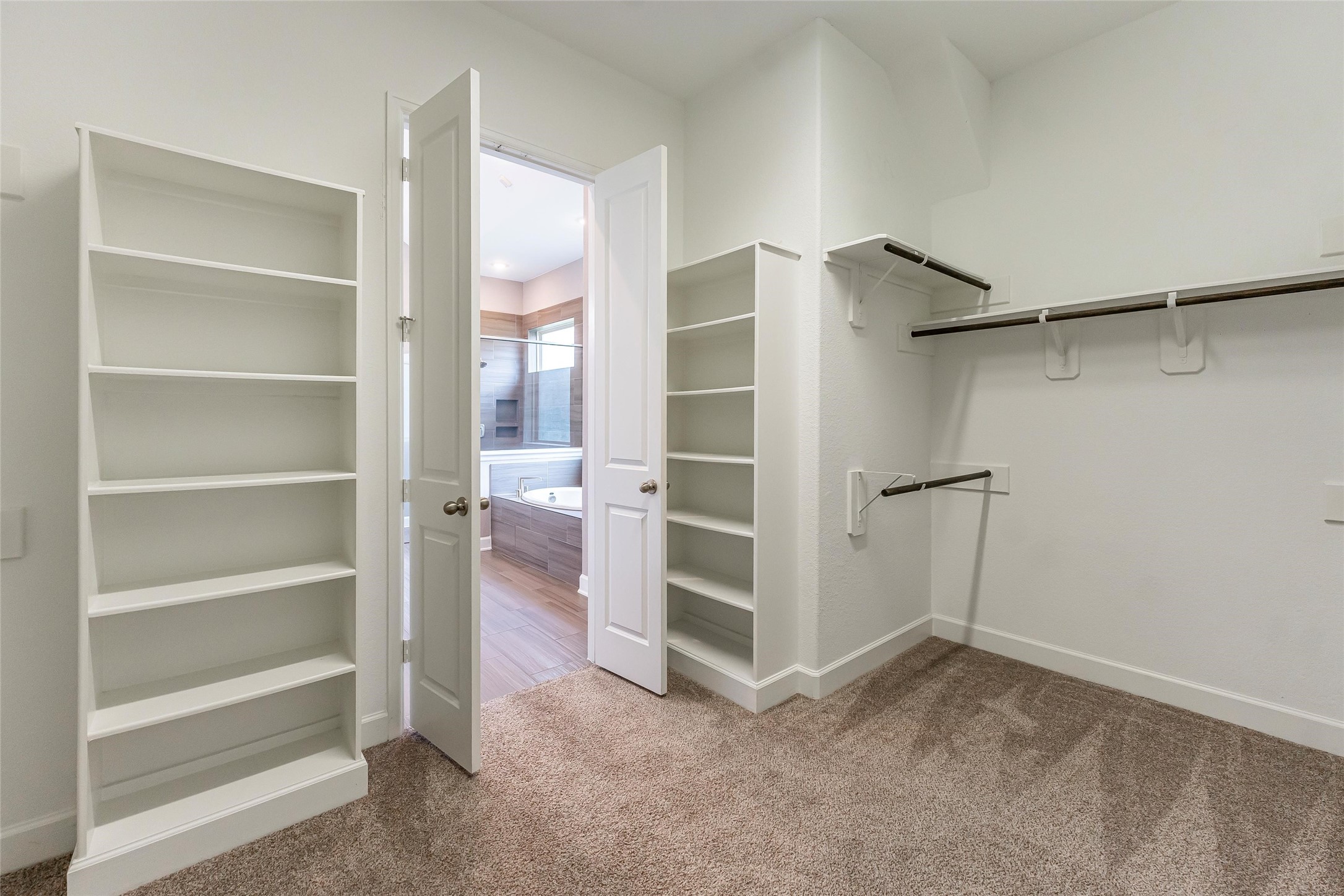 1050 Groveton Ridge Lane Pinehurst, TX 77362 - Photo 33 of 50 a view of an empty walk in closet
