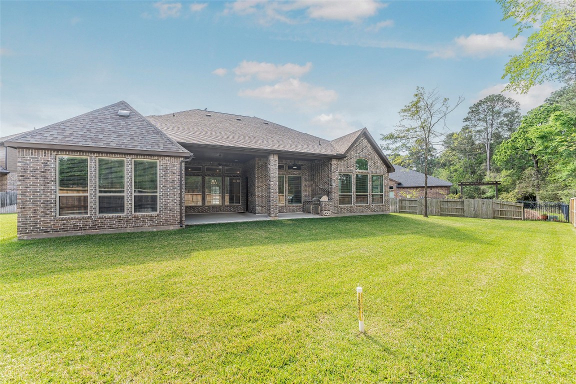 1050 Groveton Ridge Lane Pinehurst, TX 77362 - Photo 42 of 50 This is the private rear yard with no rear neighbors