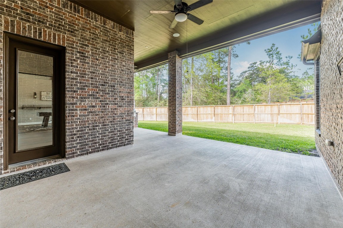 1050 Groveton Ridge Lane Pinehurst, TX 77362 - Photo 47 of 50 Another angle of the covered patio