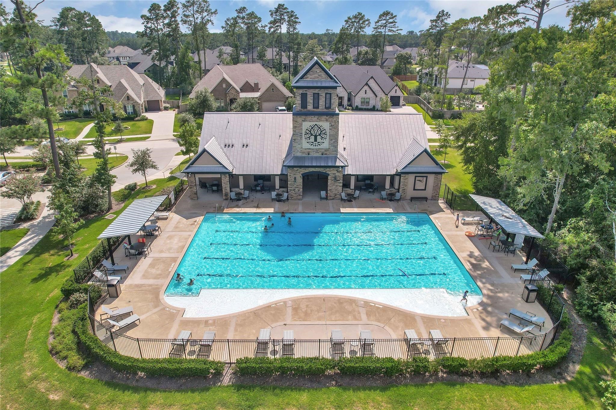 1050 Groveton Ridge Lane Pinehurst, TX 77362 - Photo 49 of 50 an aerial view of a house