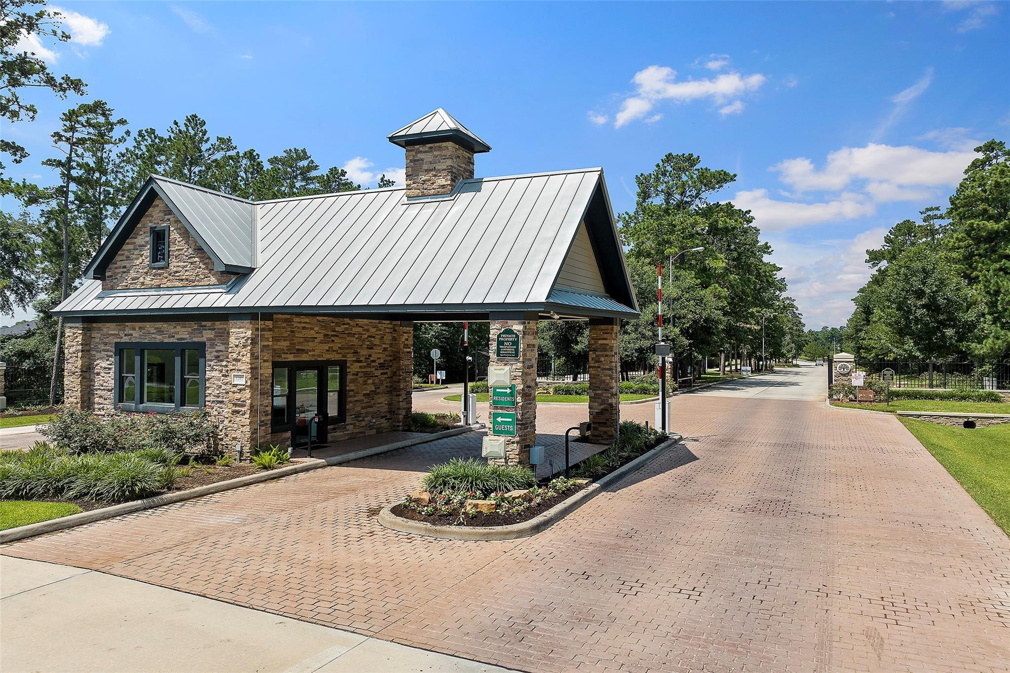 1050 Groveton Ridge Lane Pinehurst, TX 77362 - Photo 50 of 50 a front view of a house with entertaining space