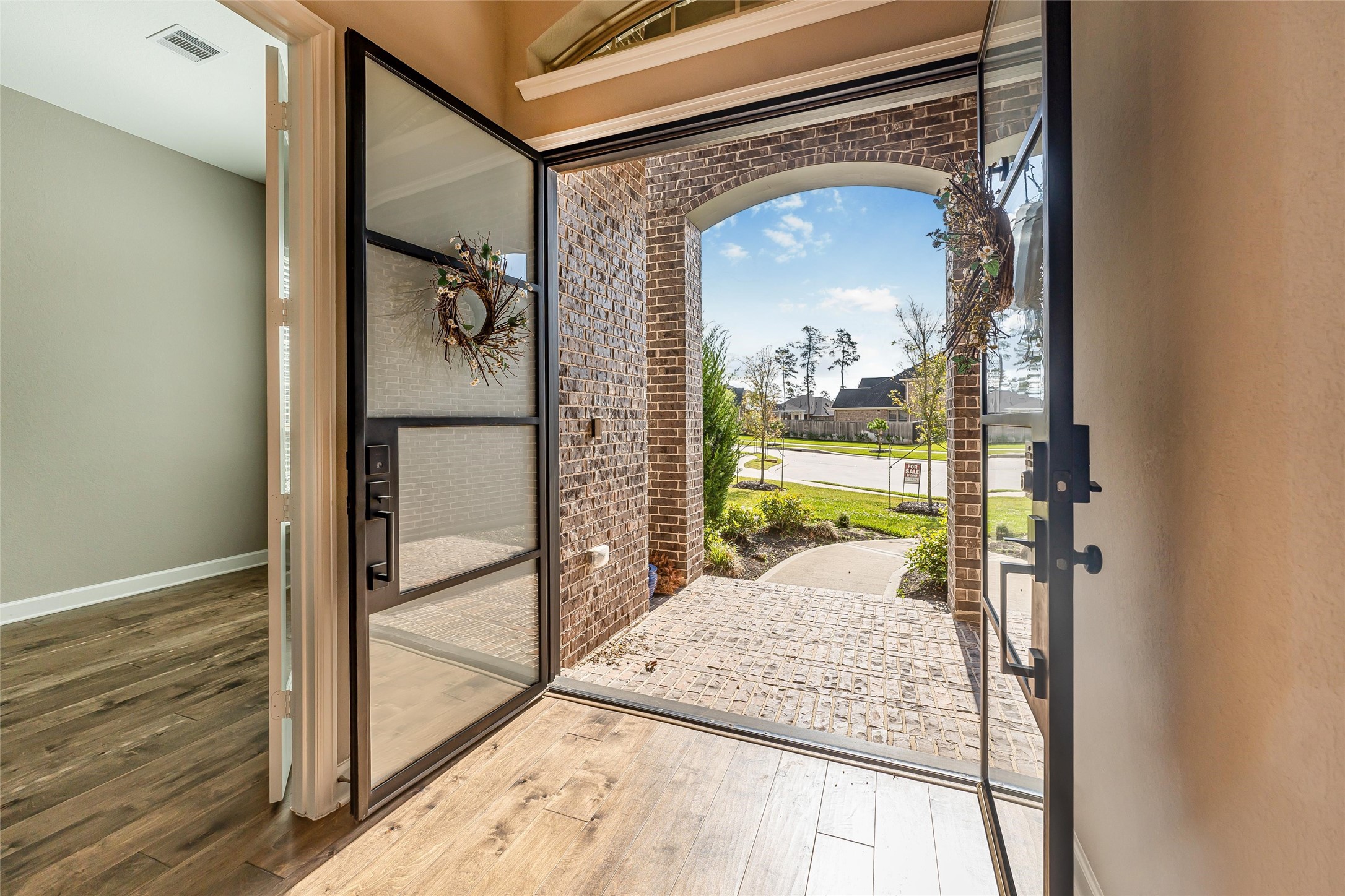 1050 Groveton Ridge Lane Pinehurst, TX 77362 - Photo 7 of 50 Entering through the fron double steel doors