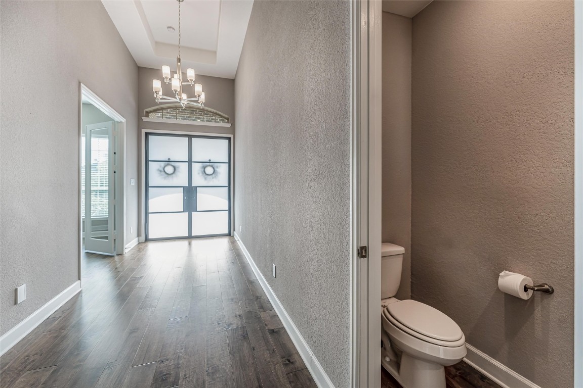 1050 Groveton Ridge Lane Pinehurst, TX 77362 - Photo 10 of 50 Looking down the front hall toward the front door