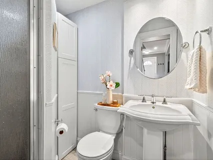 a kitchen with a washer and dryer in it