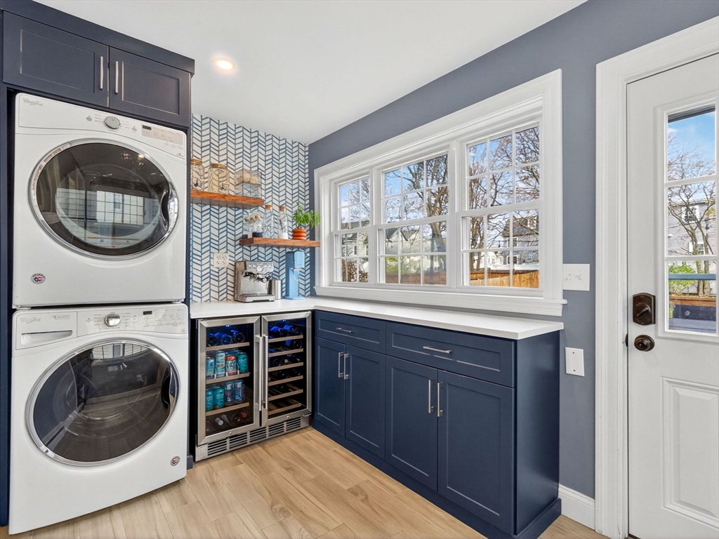 37 Rangeley Street Boston, MA 02124 - Photo 16 of 26 a kitchen with a washer and dryer in it