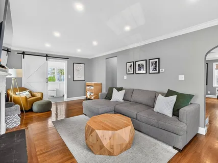 a living room with furniture and a couch