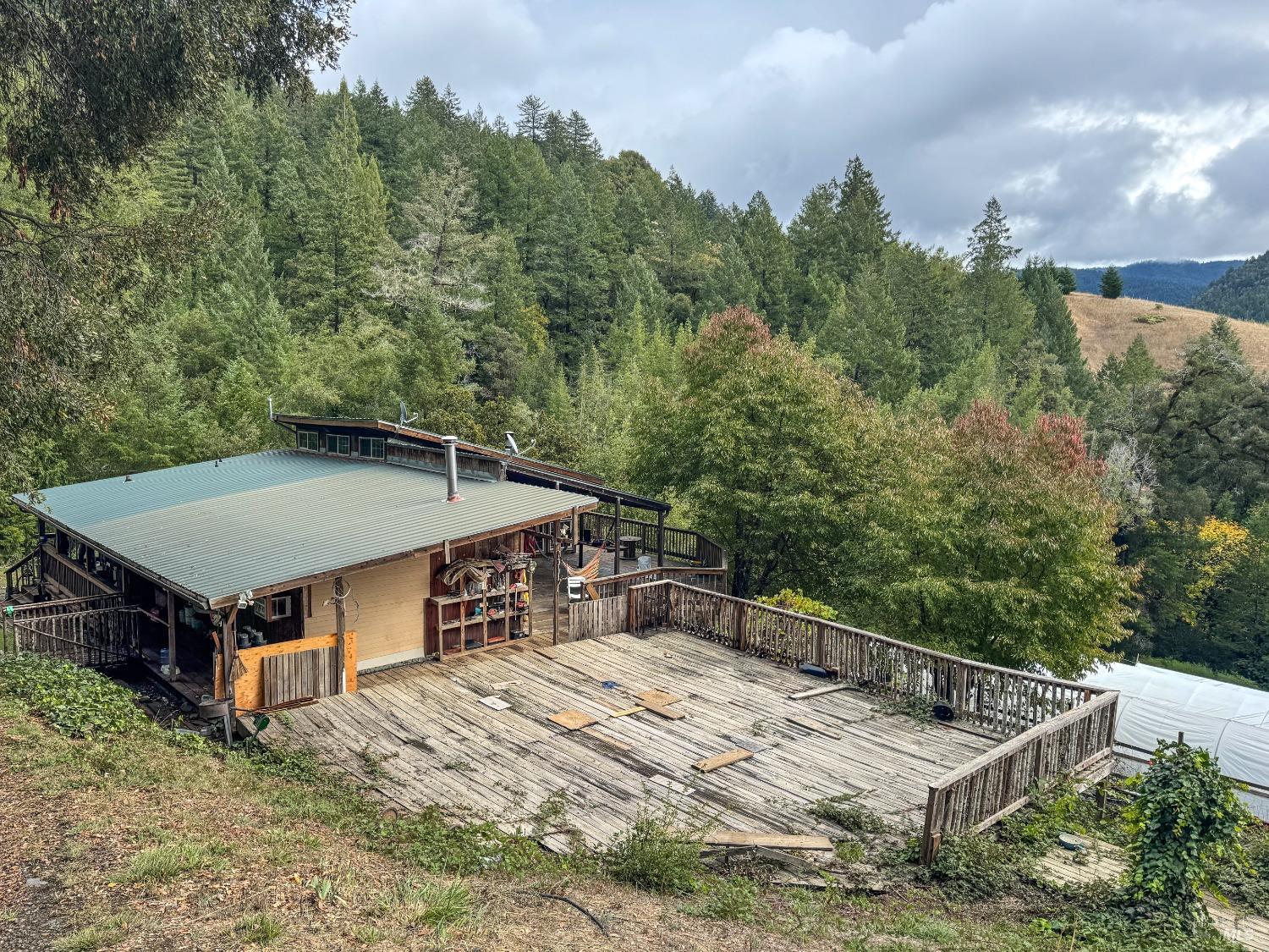 545 Bear Pen Road Piercy, CA 95587 - Photo 2 of 7 an aerial view of a house having yard