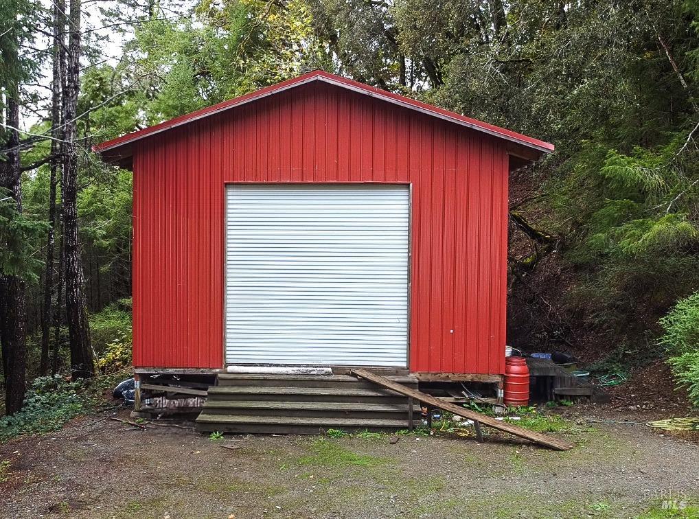 545 Bear Pen Road Piercy, CA 95587 - Photo 3 of 7 a front view of a house with a yard