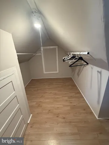 a bathroom with a toilet and a vanity