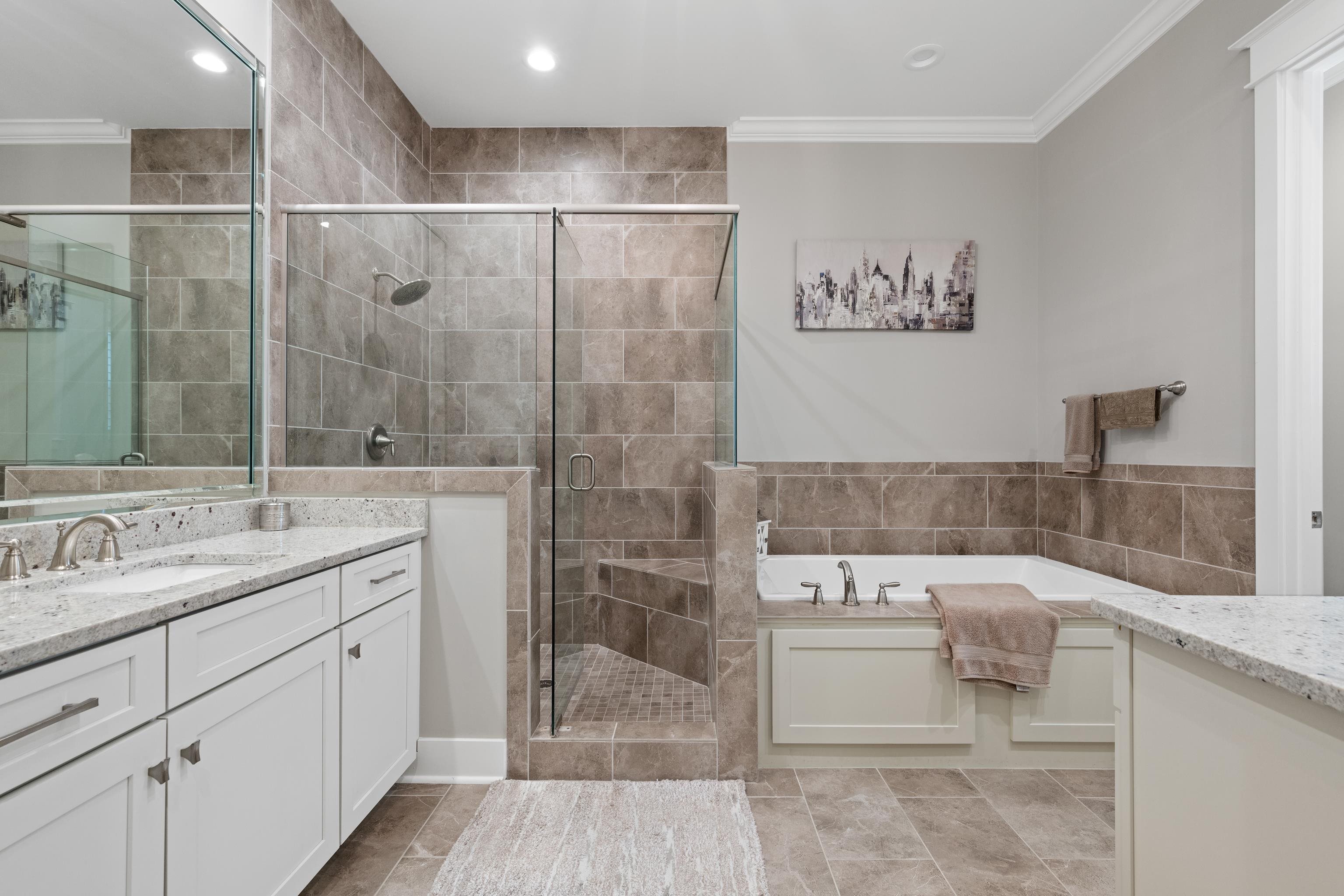 502 South Shea Road Collierville, TN 38017 - Photo 22 of 40 Bathroom with vanity, tile patterned floors, shower with separate bathtub, and crown molding