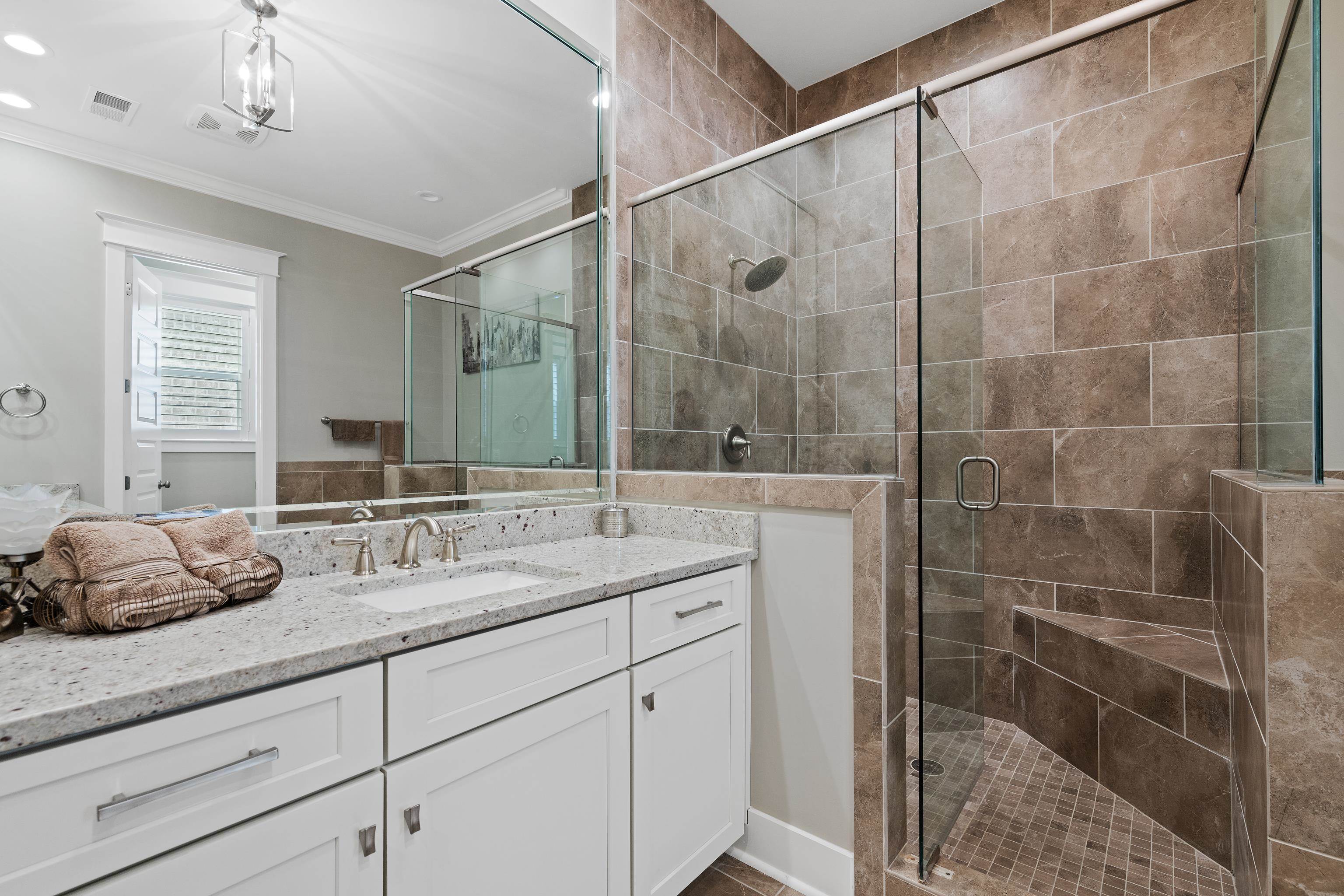 502 South Shea Road Collierville, TN 38017 - Photo 23 of 40 Bathroom with crown molding, vanity, and an enclosed shower