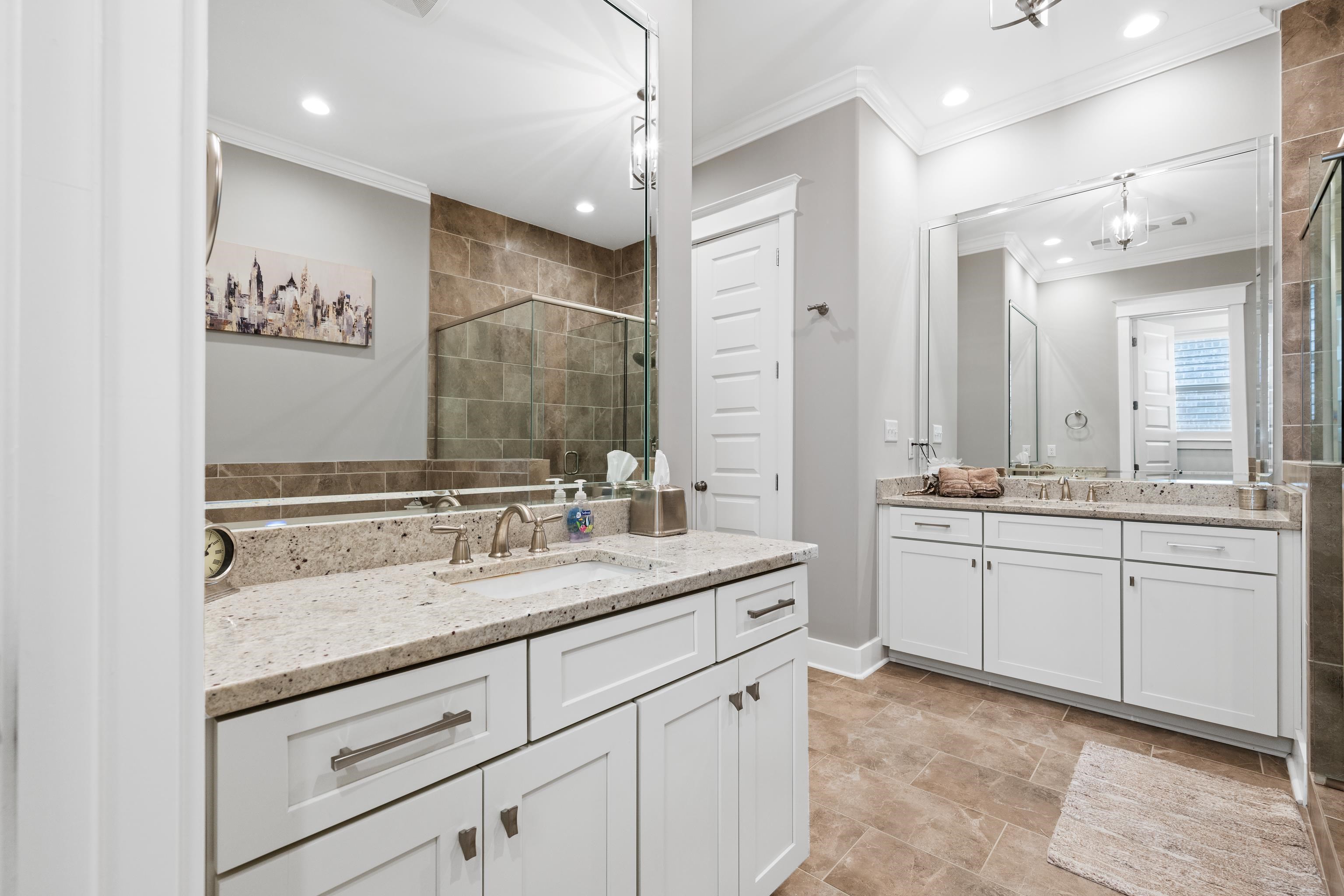 502 South Shea Road Collierville, TN 38017 - Photo 25 of 40 Bathroom with tile patterned flooring, dual bowl vanity, an enclosed shower, and ornamental molding